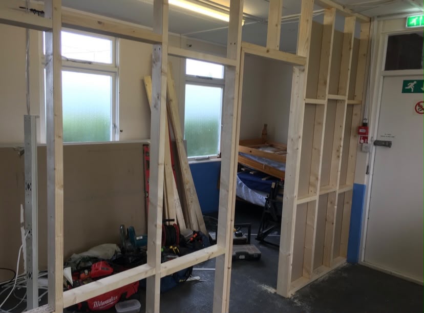Corridor with stud wall framing either side