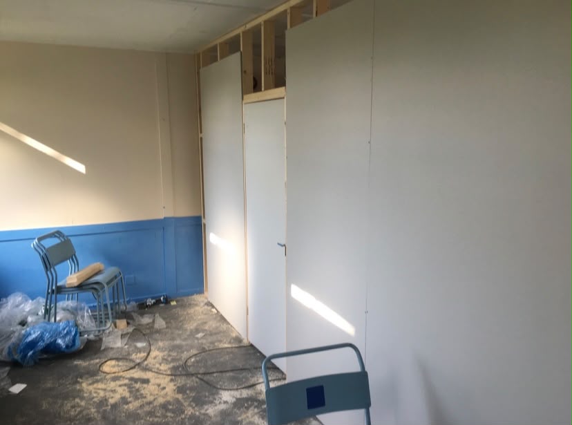 Finished corridor with plasterboard walls