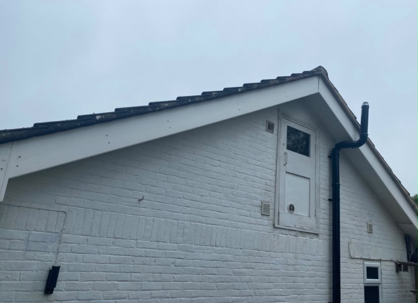 Roofline and gable end after fascia and guttering work