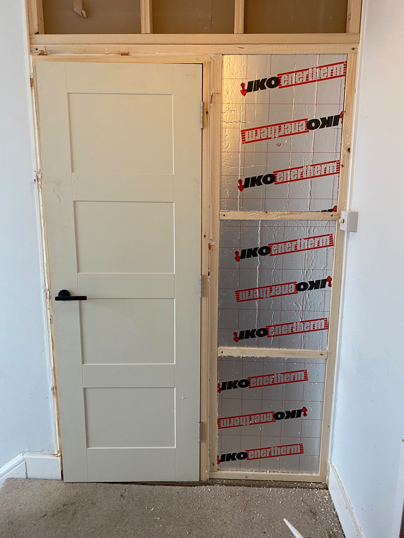 Insulation boards fitted inside a built-in storage unit